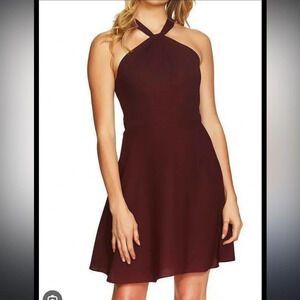 New with tags size 6 Cece burgandy red fit & flare halter sleeveless twist dress